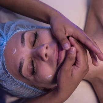 a close up of a woman